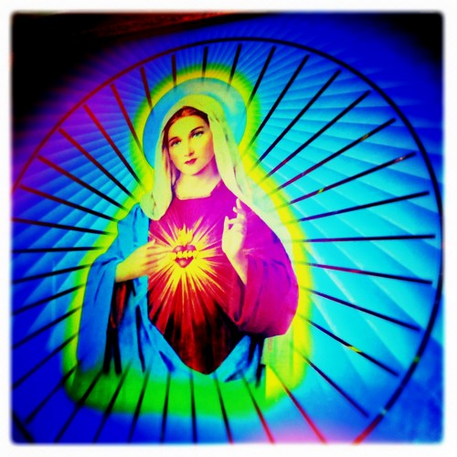 Instagram style image of a neon Virgin Mary